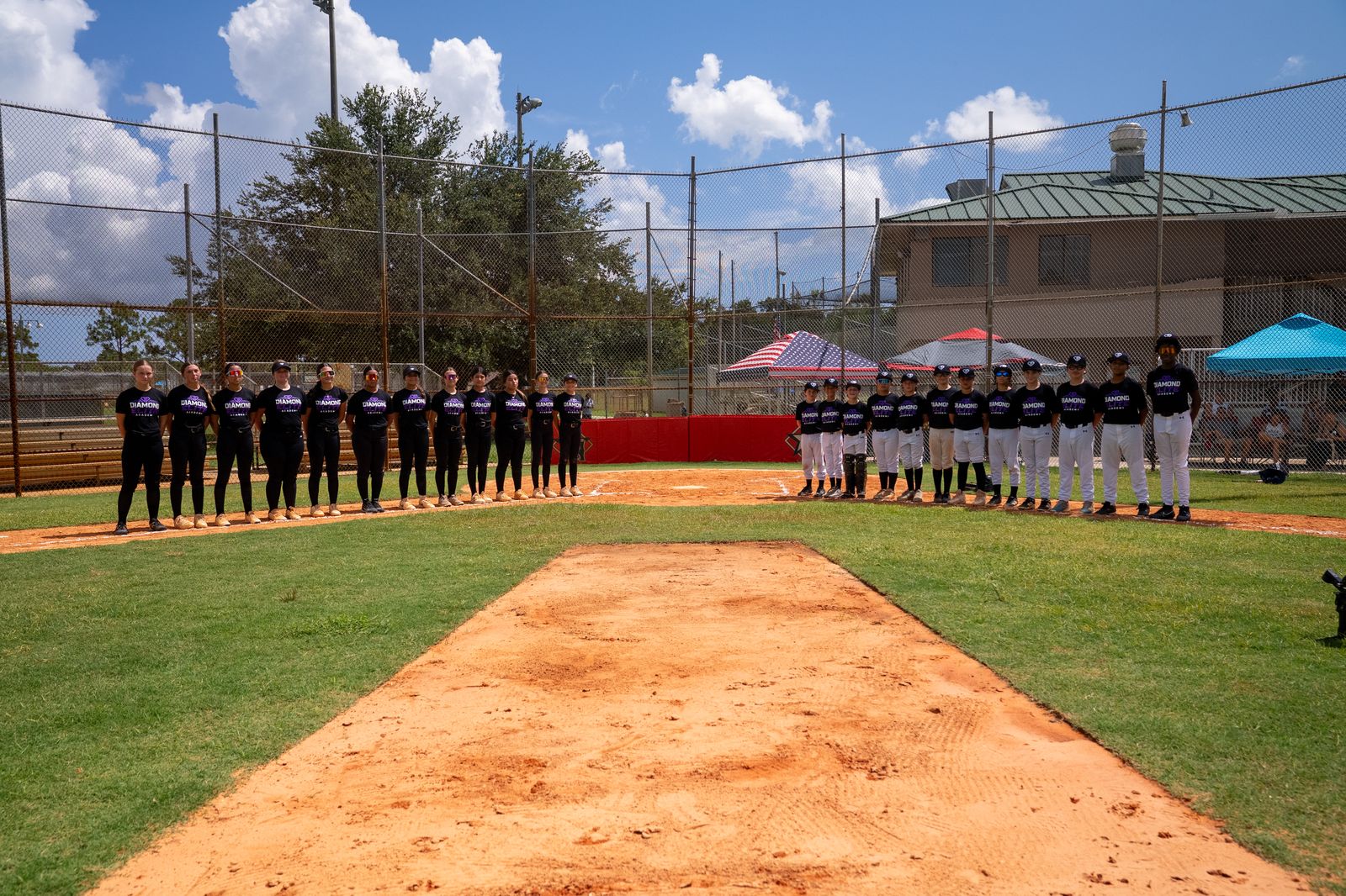 Diamond Elite Academy athletes lined up on the field